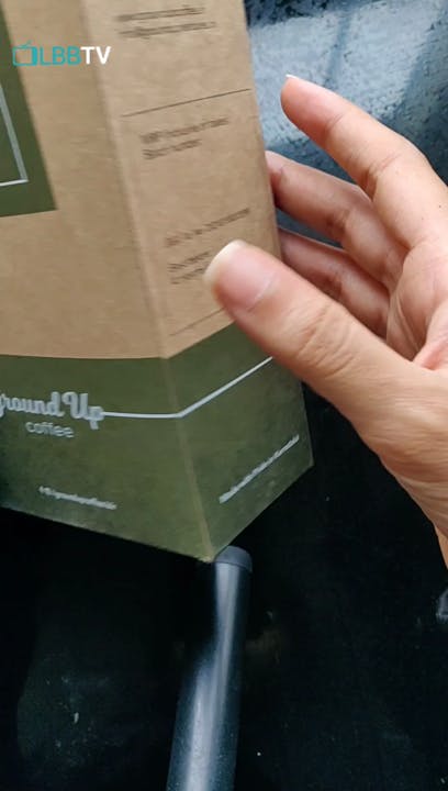 Hand,Shipping box,Gesture,Finger,Publication,Carton,Packing materials,Package delivery,Cardboard,Font