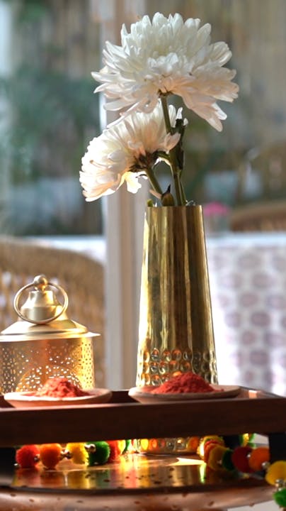 Light,Gold,Plant,Yellow,Flower,Petal,Window,Decoration,Vase,Serveware