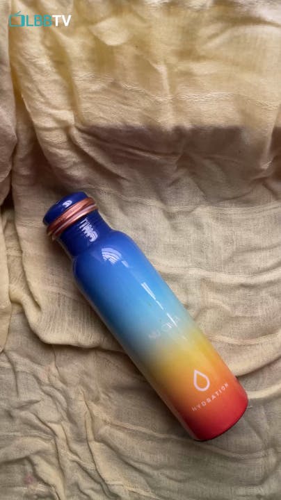 Water bottle,Bottle,Drinkware,Fluid,Plastic bottle,Cylinder,Drink,Gas,Electric blue,Plastic